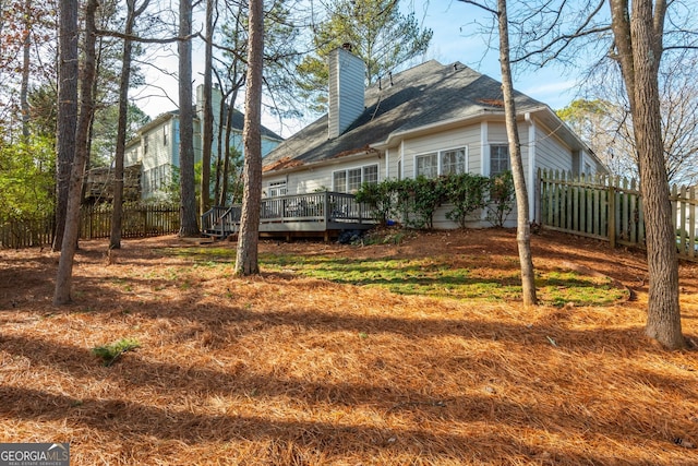 exterior space featuring a wooden deck