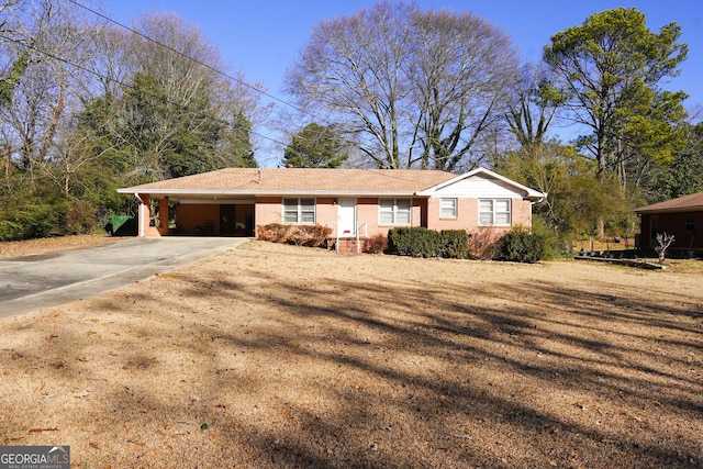 ranch-style home with a carport