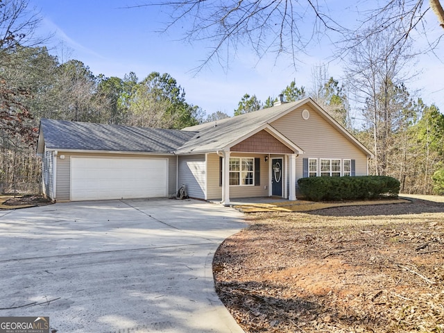 single story home featuring a garage