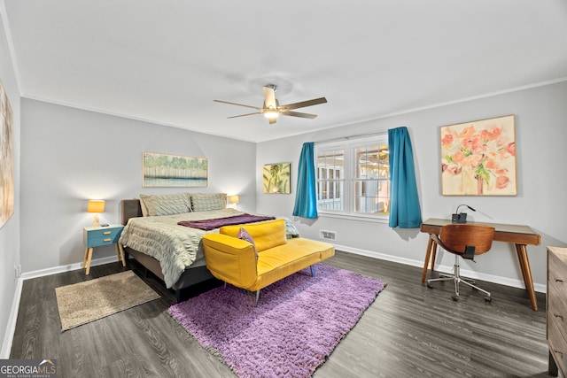 bedroom featuring visible vents, baseboards, a ceiling fan, ornamental molding, and dark wood-style flooring