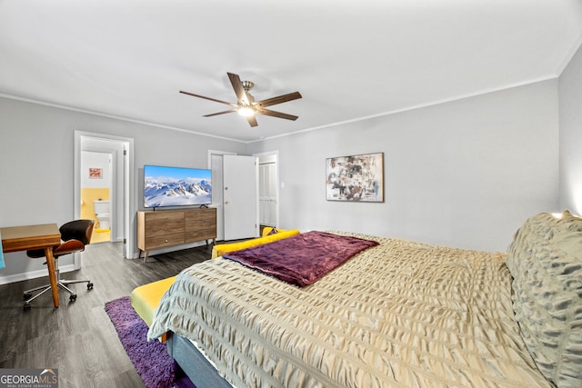 bedroom with crown molding, a ceiling fan, connected bathroom, wood finished floors, and baseboards