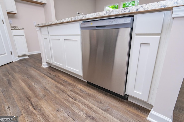 28 Russet Way Lot 60, Newnan, GA 30263 - kitchen view of stainless steel dishwasher, dark wood-style flooring, and white cabinetry
