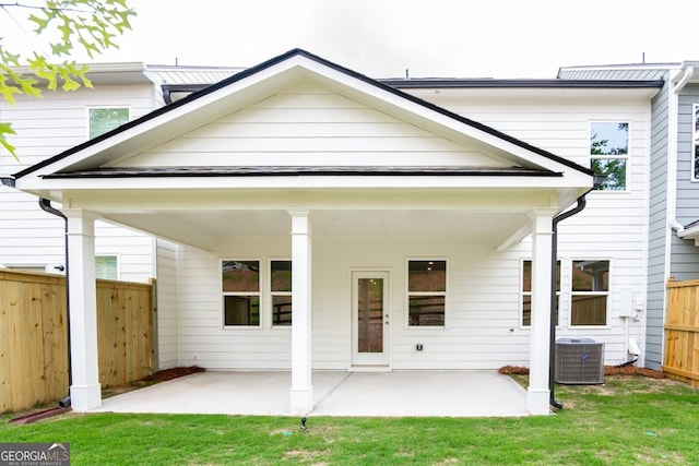 28 Russet Way Lot 60, Newnan, GA 30263 - rear view of house featuring cooling unit and a patio