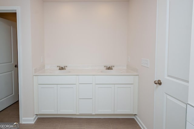 28 Russet Way Lot 60, Newnan, GA 30263 - bathroom featuring baseboards and double vanity