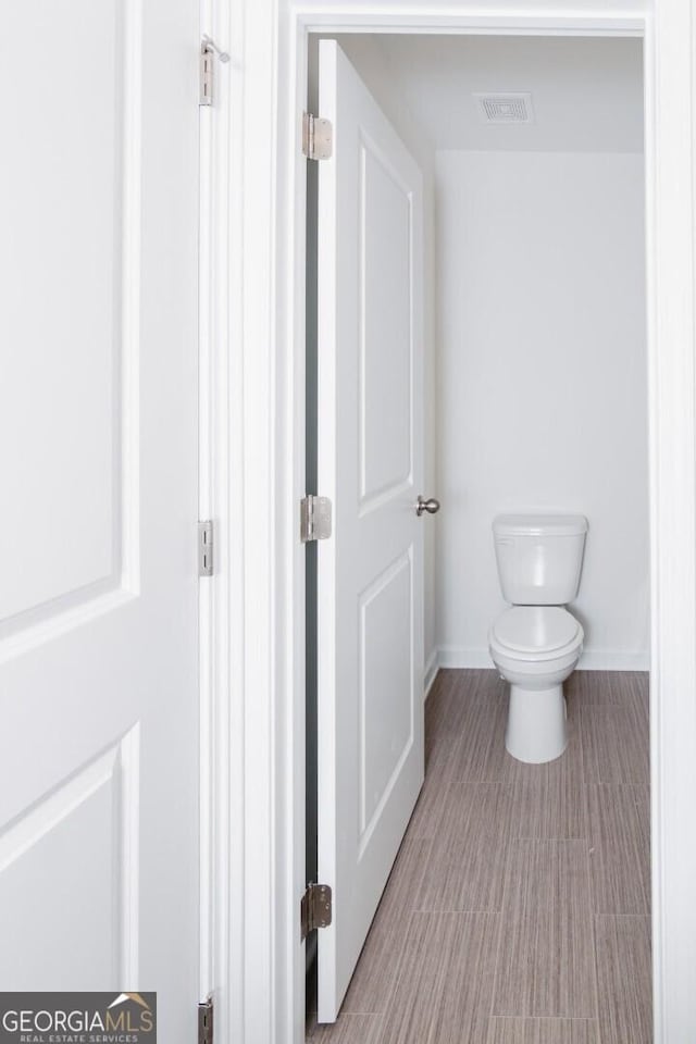 28 Russet Way Lot 60, Newnan, GA 30263 - bathroom featuring baseboards and toilet