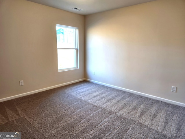 28 Russet Way Lot 60, Newnan, GA 30263 - empty room with dark carpet and baseboards