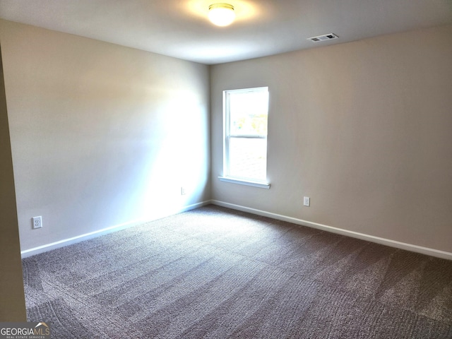 28 Russet Way Lot 60, Newnan, GA 30263 - unfurnished room featuring dark carpet and baseboards