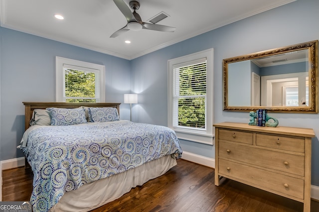 bedroom with ceiling fan, ornamental molding, and dark hardwood / wood-style floors