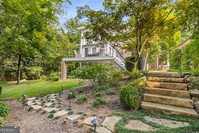 view of yard featuring a deck