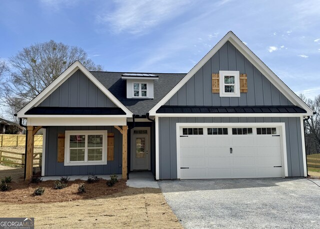 view of front of property featuring a garage