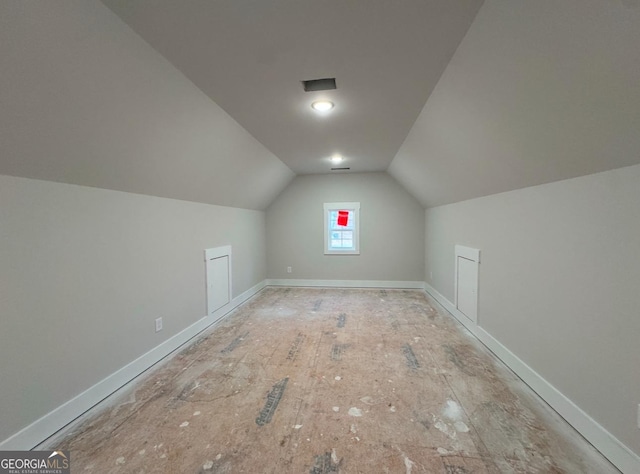 bonus room with vaulted ceiling