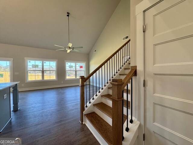 stairway with vaulted ceiling