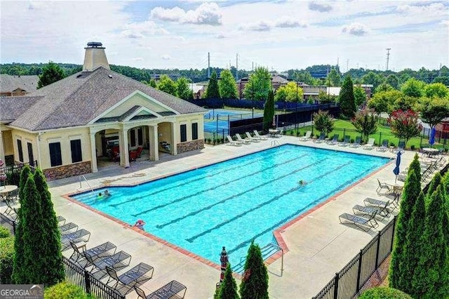 view of pool with a patio area