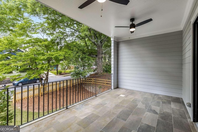 balcony featuring ceiling fan