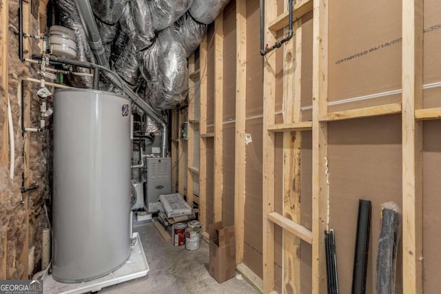 utility room with gas water heater