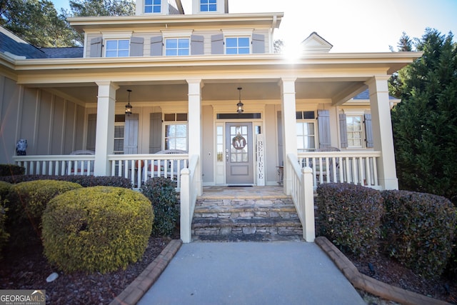 entrance to property with covered porch