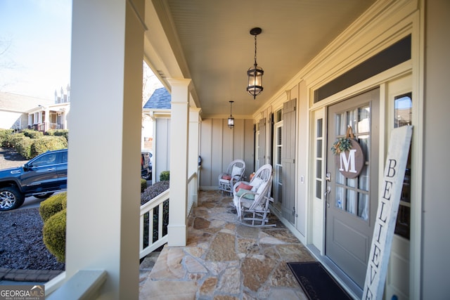 property entrance with a porch