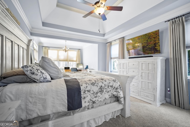 carpeted bedroom with crown molding, a raised ceiling, and ceiling fan with notable chandelier