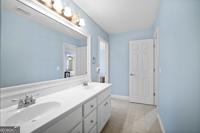 bathroom with vanity and tile patterned floors