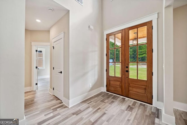 220 Autumn Brook Dr, Canton, GA 30115 - entryway featuring french doors and light wood-style floors