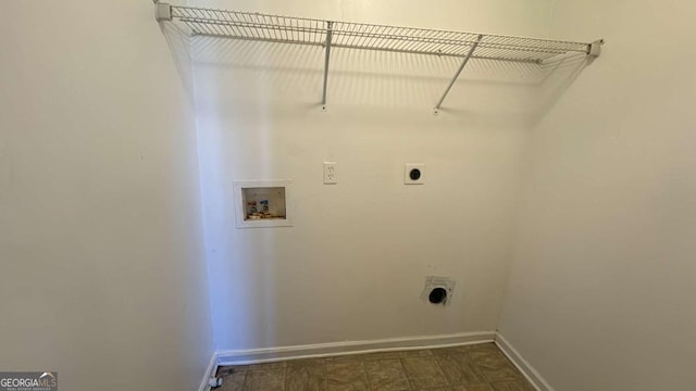 washroom with washer hookup and hookup for an electric dryer