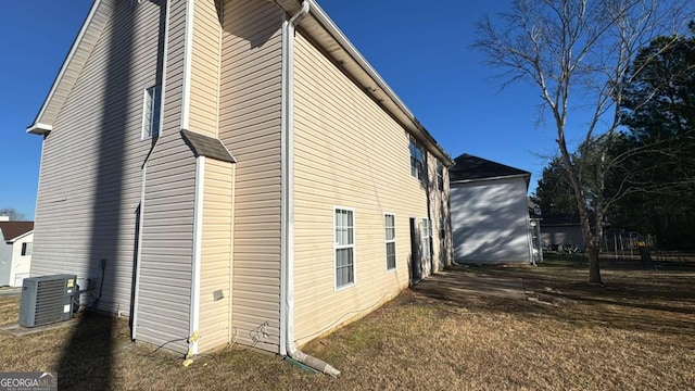 view of home's exterior featuring central air condition unit