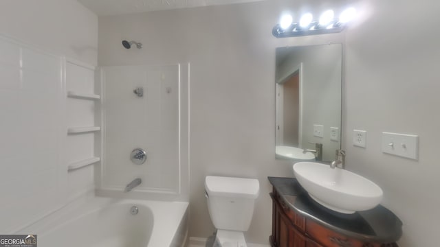 full bathroom with toilet, vanity, and shower / bathtub combination