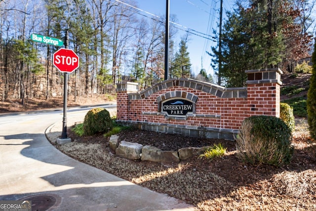 view of community sign