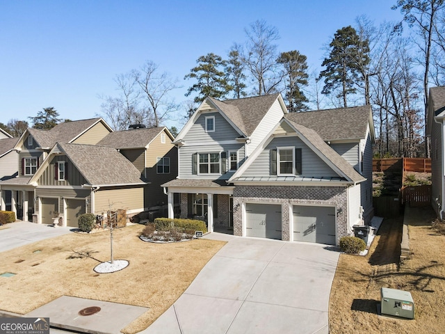 craftsman house with a garage