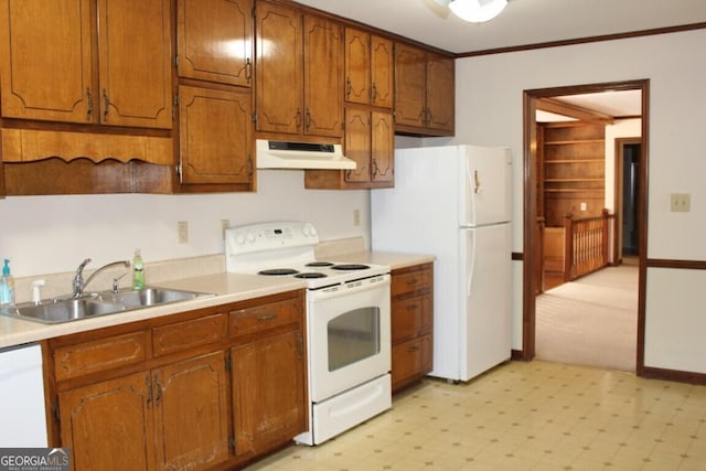 kitchen featuring under cabinet range hood, white appliances, a sink, light countertops, and light floors