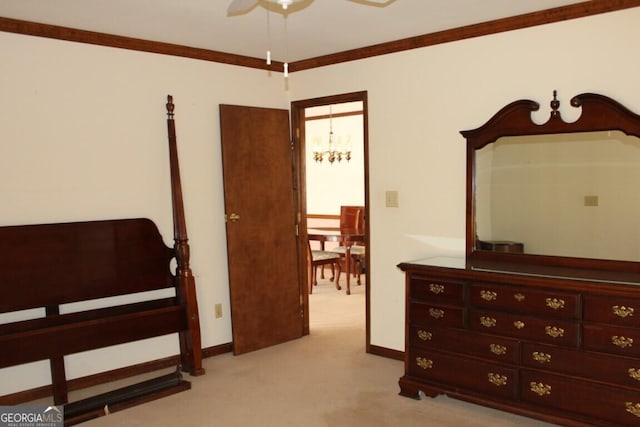 bedroom with carpet floors, baseboards, ornamental molding, and ceiling fan with notable chandelier