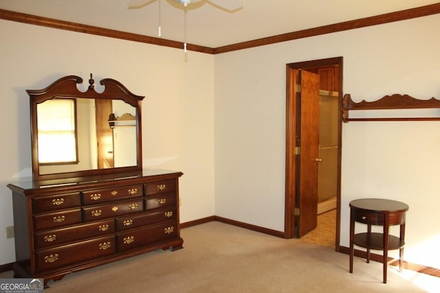 bedroom featuring ornamental molding, light carpet, baseboards, and a ceiling fan