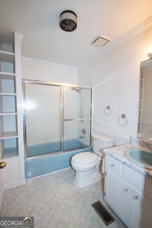 bathroom with visible vents, crown molding, vanity, and combined bath / shower with glass door