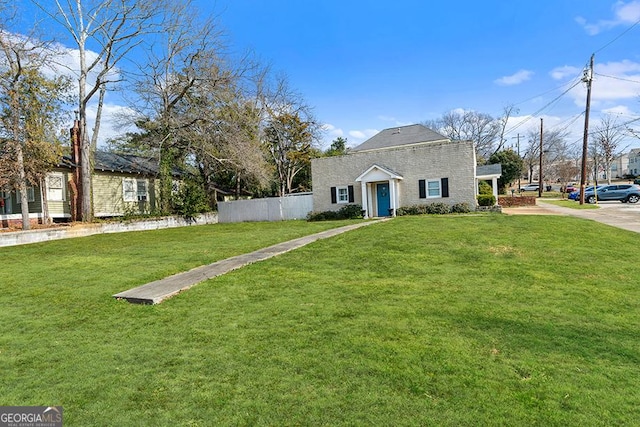 view of front of home with a front lawn