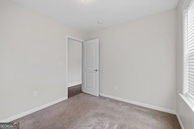 empty room with light carpet