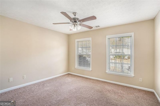 3055 Cooper Woods Ln, Loganville, GA 30052 - carpeted spare room with baseboards and ceiling fan