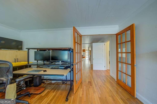 office area with crown molding, light hardwood / wood-style flooring, and french doors