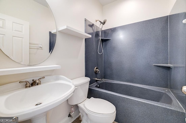 full bathroom featuring sink, toilet, and  shower combination