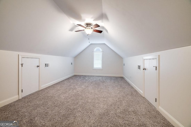 bonus room featuring vaulted ceiling, ceiling fan, and carpet flooring