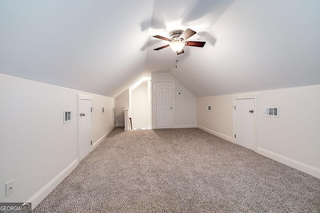 bonus room featuring carpet floors, ceiling fan, and vaulted ceiling