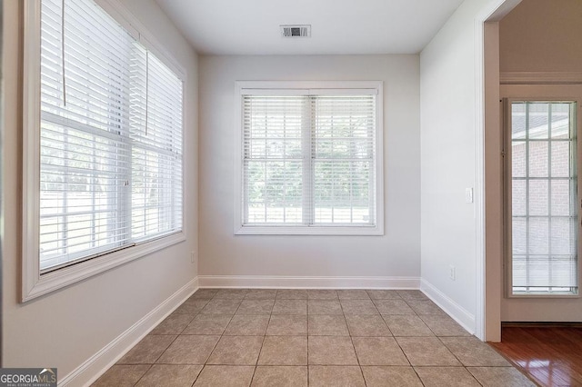 view of tiled empty room