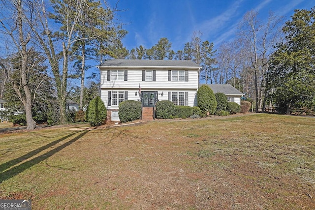 colonial home with a front yard