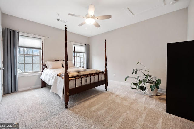 carpeted bedroom with ceiling fan