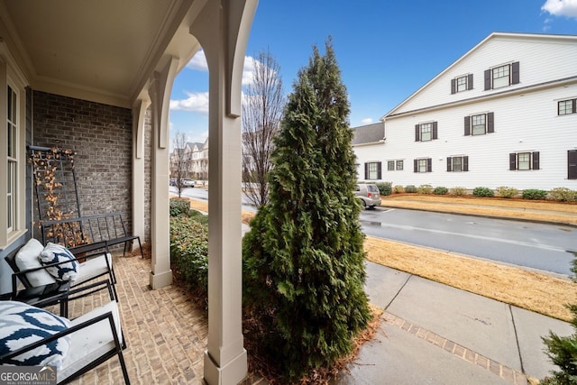 exterior space featuring covered porch