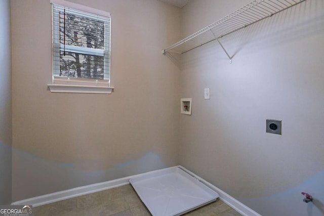 laundry area with washer hookup and hookup for an electric dryer