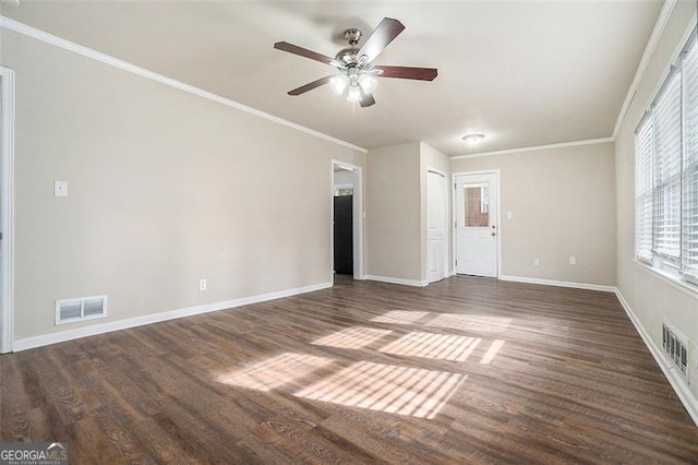 unfurnished room with dark wood-type flooring, ornamental molding, and ceiling fan