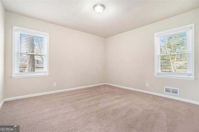 view of carpeted spare room