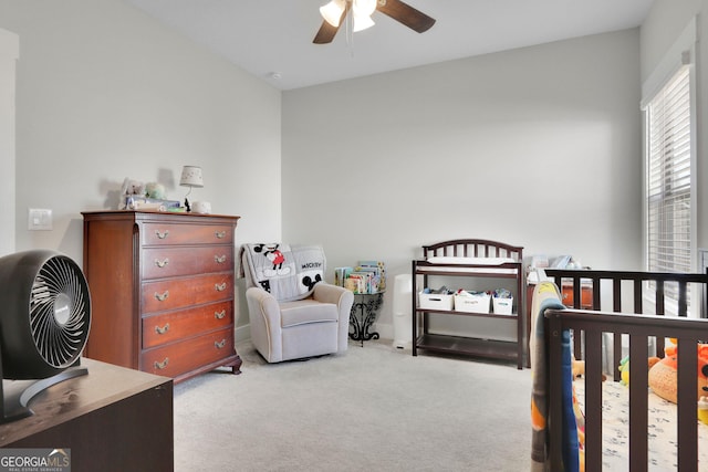 bedroom featuring light carpet