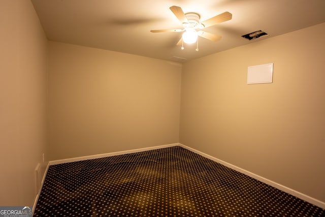 spare room with ceiling fan