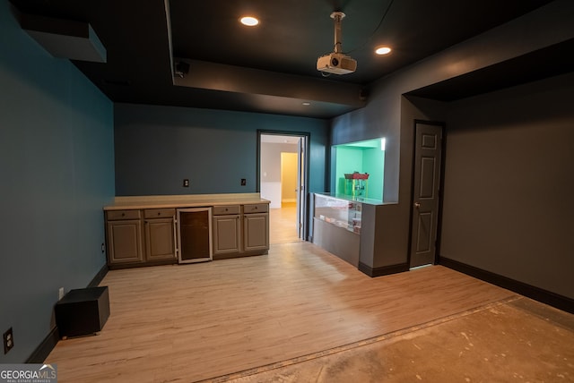 kitchen featuring light hardwood / wood-style flooring and wine cooler